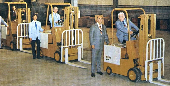Line of 1970’s Yale electric lift trucks.