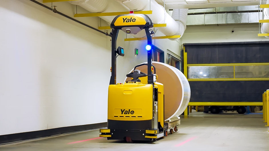 Automated Yale lift truck in warehouse.